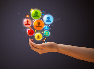 Social network icons in the hand of a woman