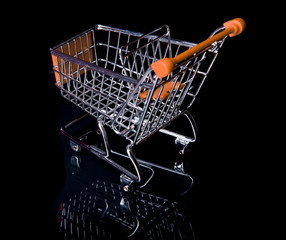 Empty Shopping Cart isolated in black