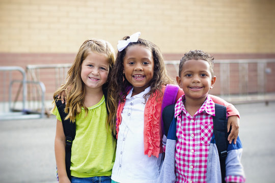 Diverse group of young kids going to school