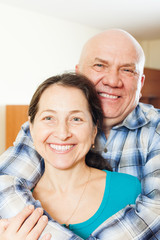 Happy elderly man with  smiling girlfriend