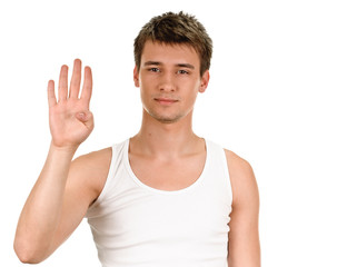 young man shows sign and symbol by hands on white background