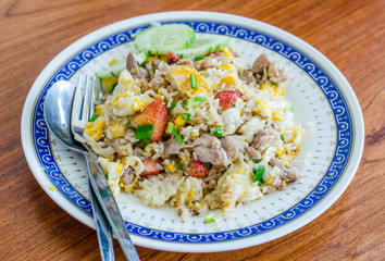 Fried rice with pork ,egg and strawberry
