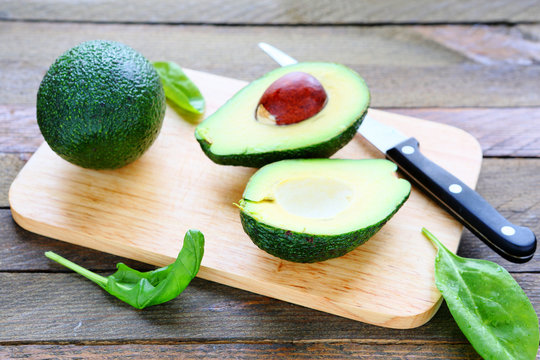 fresh avocado on a kitchen board
