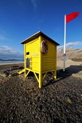 lifeguard chair red flag  coastline and summer