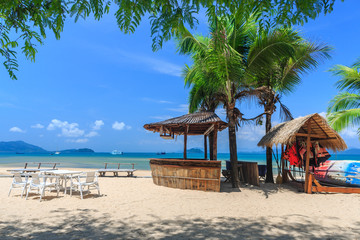 Baboo bar on white snad beach at tropical island