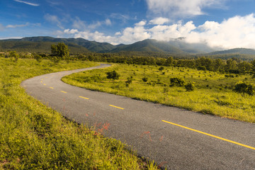 Beautiful countryside road under blue sky