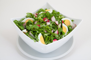 green salad in white plate