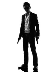 asian gunman killer standing   silhouette