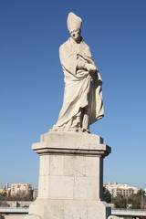 Fototapeta na wymiar Puente de La Trinidad, statue on bridge in Valencia, Spain