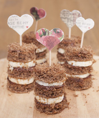 Canape biscuit with banana and walnut - chocolate cream.