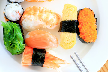 sushi with chopsticks