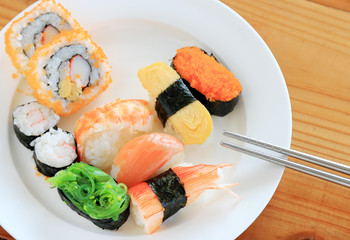 sushi with chopsticks