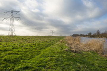 Canal through a rural landscape in winter