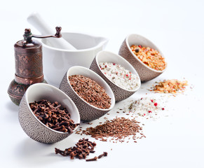 spices in a small ceramic cups