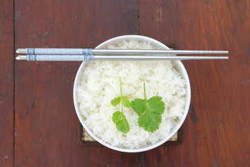 rice in white bowl with chopstick