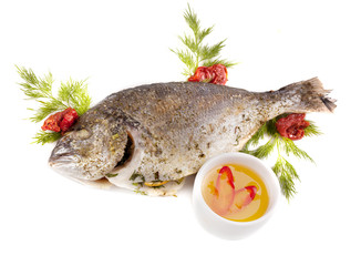 Fried dorado served with sauce