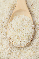 Raw rice and spoon
