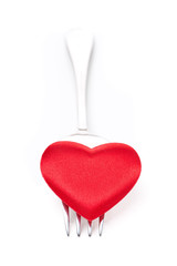 red heart on a fork, concept, isolated