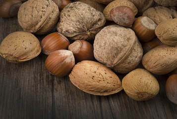 Nuts mix close up on the wood table