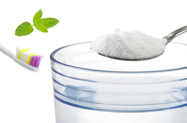 Iron spoon of baking soda close up