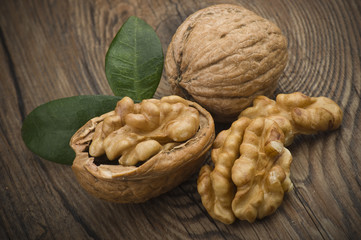 Walnuts group close up on the wooden table