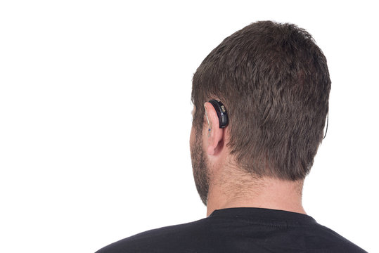 Young Deaf Or Hearing Impaired Man With Cochlear Implant And Hea