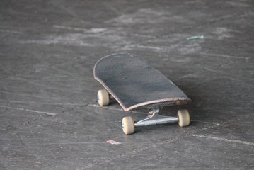 skateboard in skate park, skateboard with no one with copy space stock, photo, photograph, picture, image © cheekylorns
