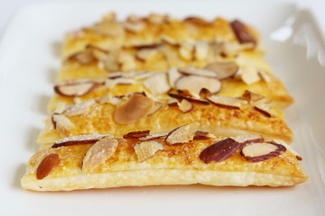 Puff pastry with almond flakes