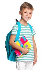 Little boy with exercise books