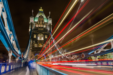 Fototapeta na wymiar Tower Bridge at NIght with Light Trails left by Passing Buses