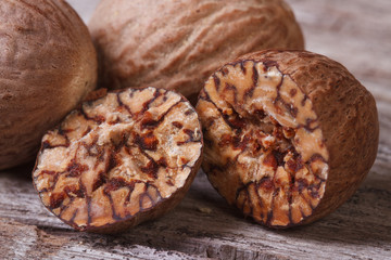 Nutmeg sectional close-up on an old wooden table