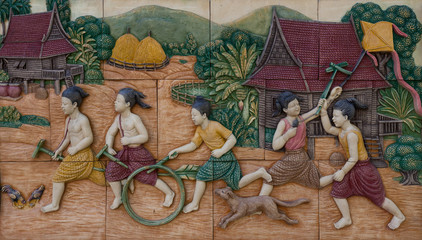 play of thai children on tile