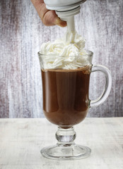Irish coffee on wooden table