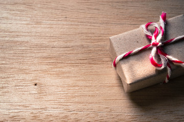 Gift box on wooden background