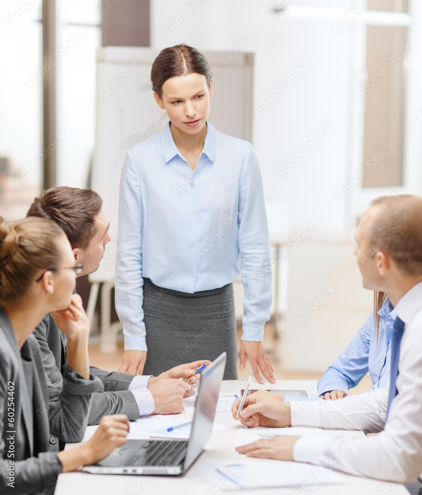 Poster strict female boss talking to business team