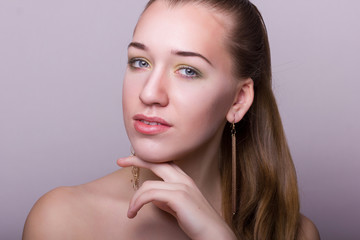 Studio beauty portrait of a beautiful young woman