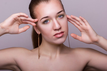 Naklejka premium Studio beauty portrait of a beautiful young woman