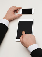 businessman working with tablet pc and smartphone