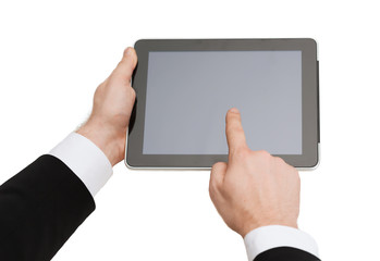close up of man hands touching tablet pc