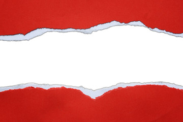 Ripped red paper on white background. Copy space