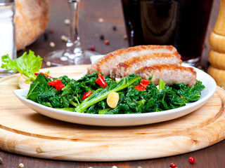 Sausages with vegetable garnish, cime di rapa