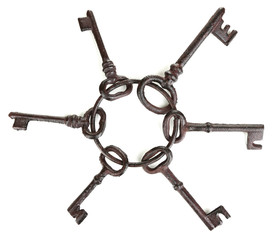 Bunch of old keys isolated on white