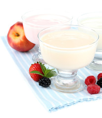 Delicious yogurt with fruit and  berries isolated on white