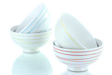 Little bowls isolated on white