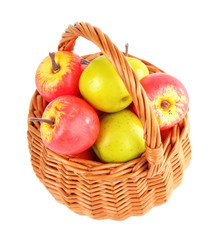 Small apples in wicker basket, isolated on white