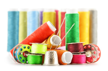 Composition with tailor needles and threads over white