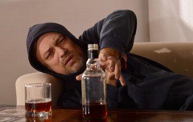 Man drinks whiskey