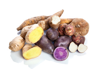 Raw vegetables - tubers - on white background