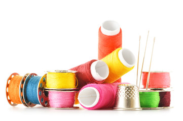 Composition with tailor needles and threads over white