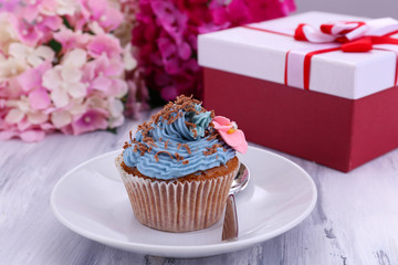Tasty cupcake with butter cream,